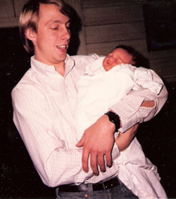 John Heissenbuttel holding Jessie Leigh Heissenbuttel, born March 20, 1986