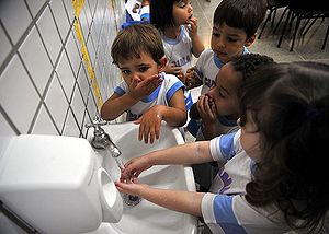 Kids washing hands.