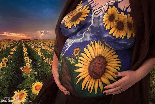 Facebook bans photo of painted mother-to-be